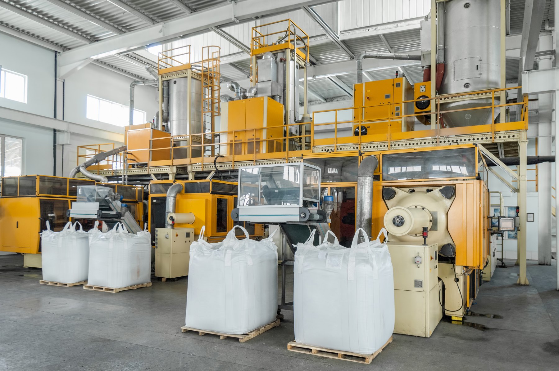 CPG production area with bulk material containers